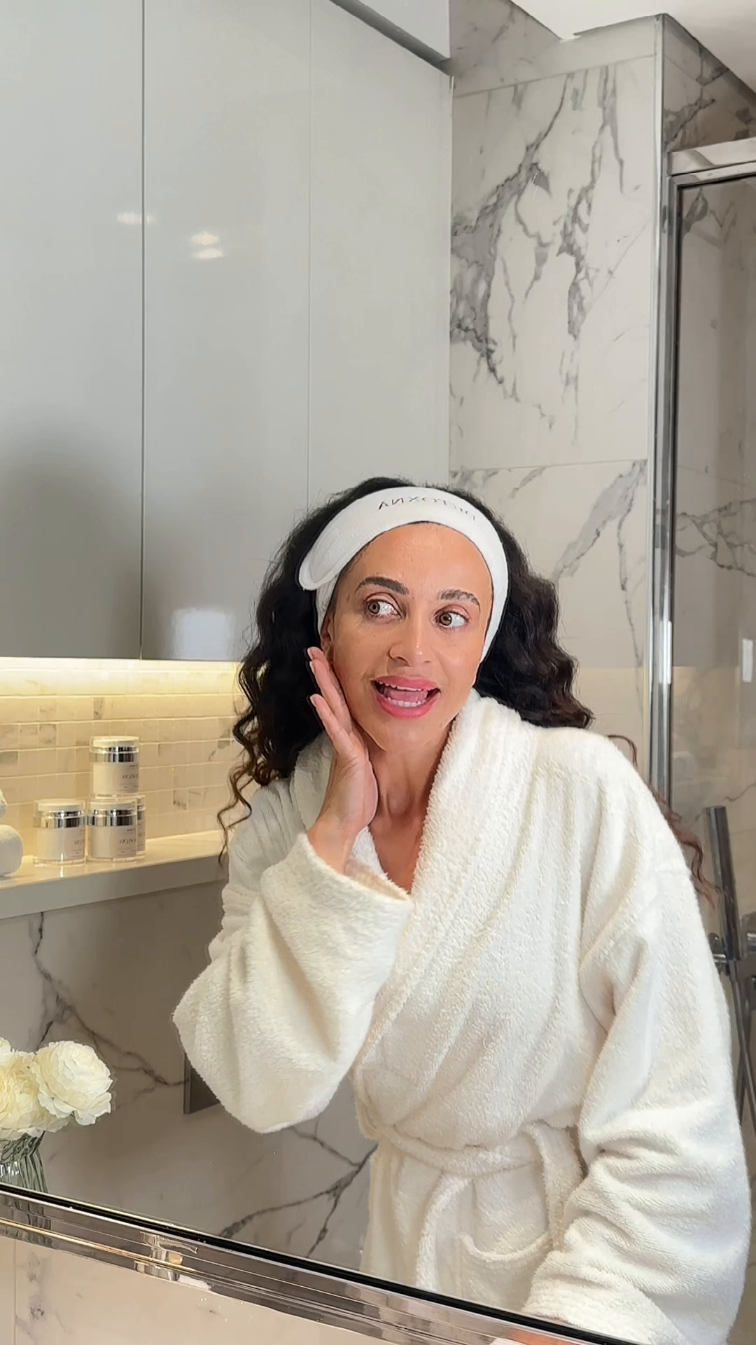 Nayara demonstrating facial drainage technique